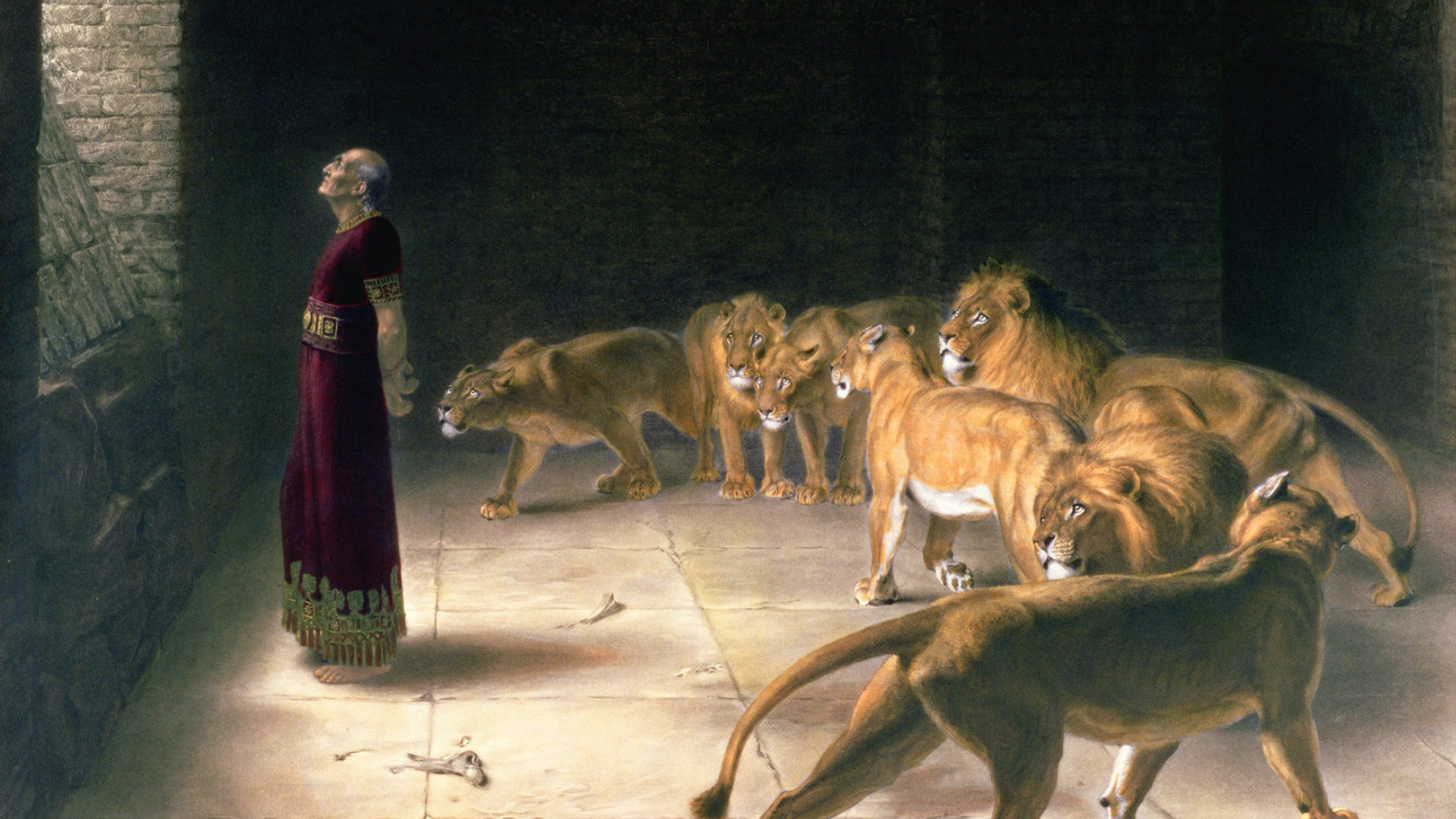 Painting of the prophet Daniel stranding in the den with lions