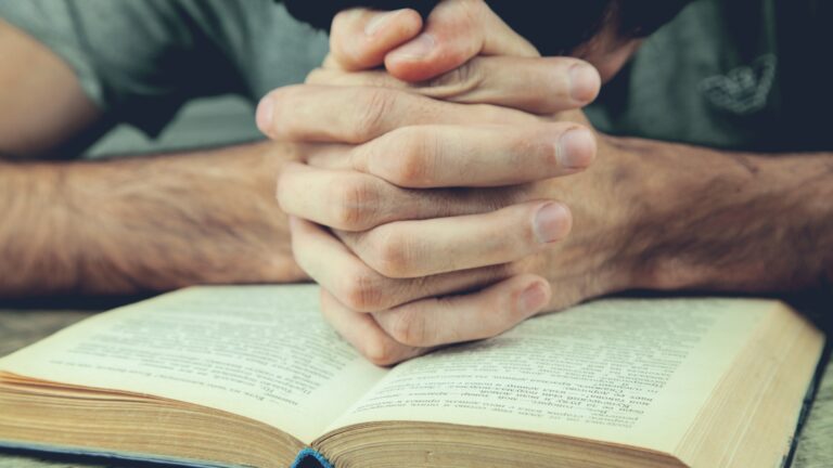 man with open Bible