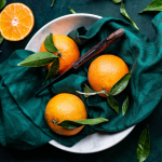 Citrus Fruit in bowl with a knife