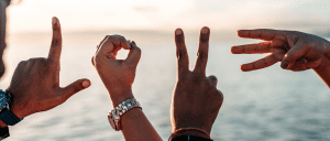 Friendship - People spelling LOVE together