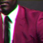 Africa's Self-Styled Prophets - African man in shiny burgundy suit and tie - slightly blurred