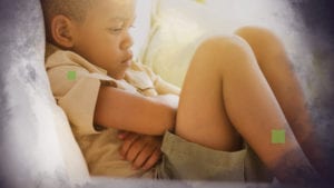 Getting to the heart of behaviour - image of an African boy sulking
