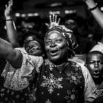 Group of African people celebrating - is it possible to rejoice always?