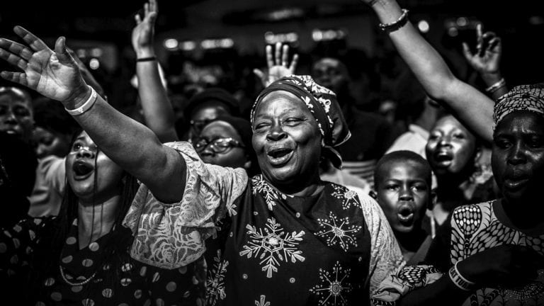 Group of African people celebrating - is it possible to rejoice always?