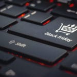 Black Friday as the enter key on a black computer keyboard