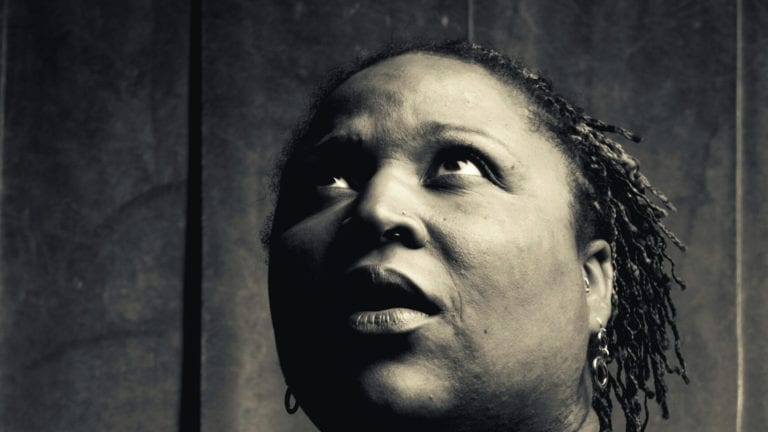 Generational curses - the dangers: African woman looking up and back, full of fear