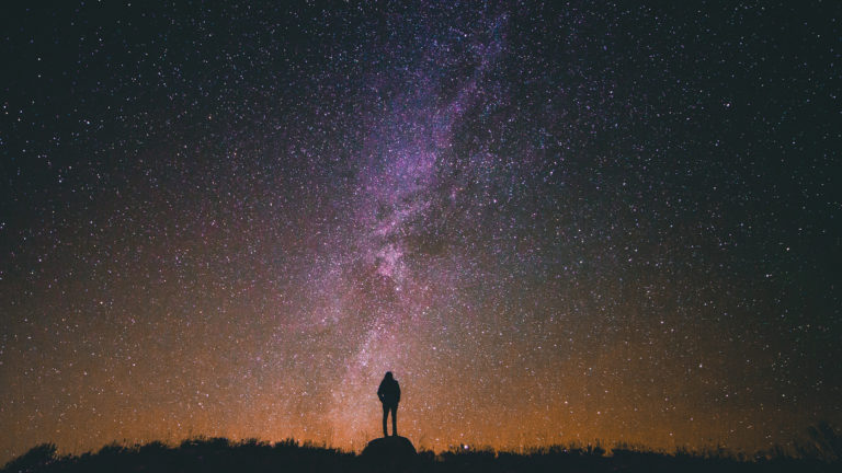 God's Glory- Person looking up at night sky