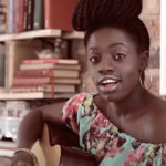 He's the love: How god rescued Lilly Million - Lilly singing with her guitar