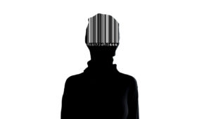 666 mark of the beast - A silhouette of a person with a barcode imprinted across their head.
