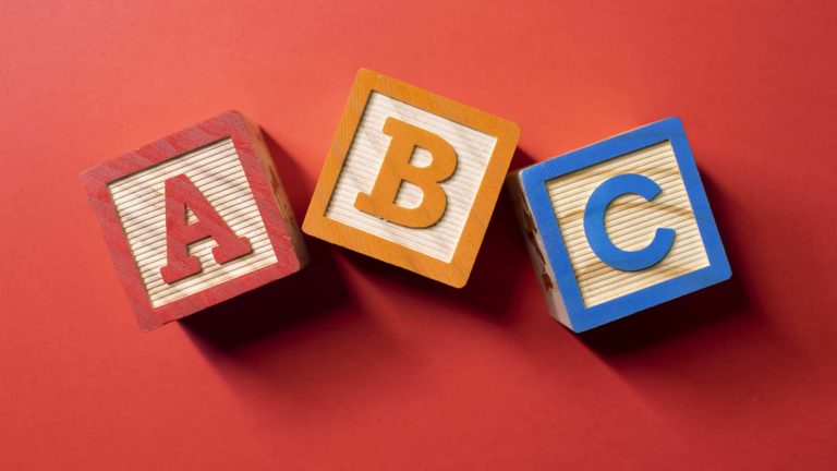 Spiritual Immaturity - Three child like wooden blocks with letters A, B, C inscribed on each individual block