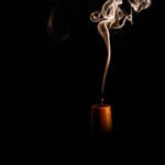 Ancestor Worship - A candle burning