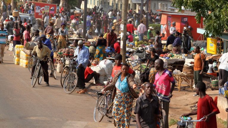 Preaching to the poor - A busy road in a township filled with people