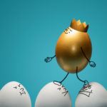 Bad role models - A vector image of golden character egg, walking over white character eggs