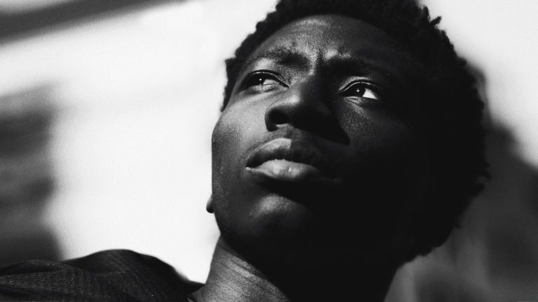 Discernment - An image of a guy's face, looking suspicious