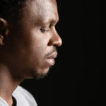 Suffering - A man's face looking worried and thoughtful