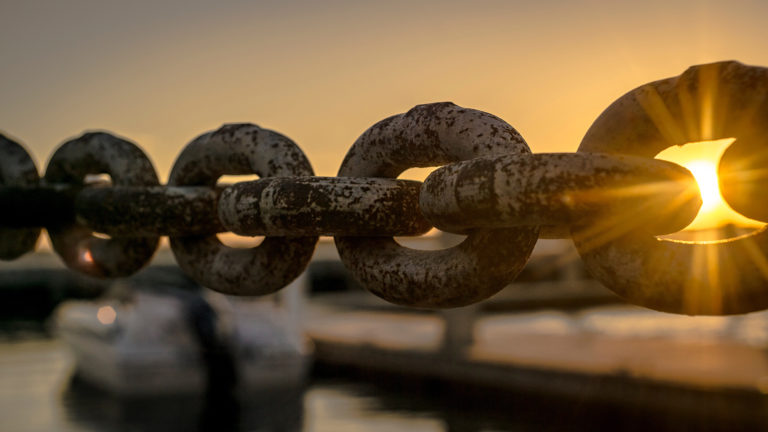 Saving Faith - A heavy thick chain, with sunshine shinning through the background