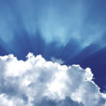 Miracles - A cloud in the sky with sunlight beaming from behind it