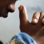 Biblical Prayer - A person praying, hands folded
