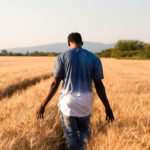 Mental Health (African perspective) - A man walking through a wheat field