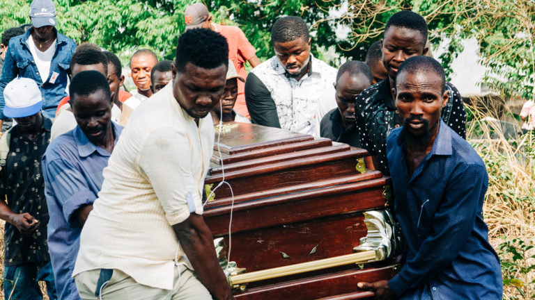 Death - A group of men carrying a coffin