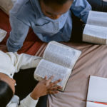 The Bible - Two people reading the bible