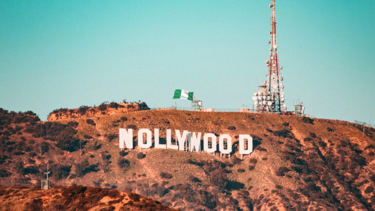 Nollywood - A mountain with Nollywood sign on it.