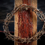 Jesus on the Cross - The cross with a bloodstain on and a crown of thorns