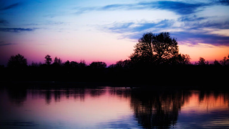 Suffering - A landscape image, early in the morning with a purple and pink sky