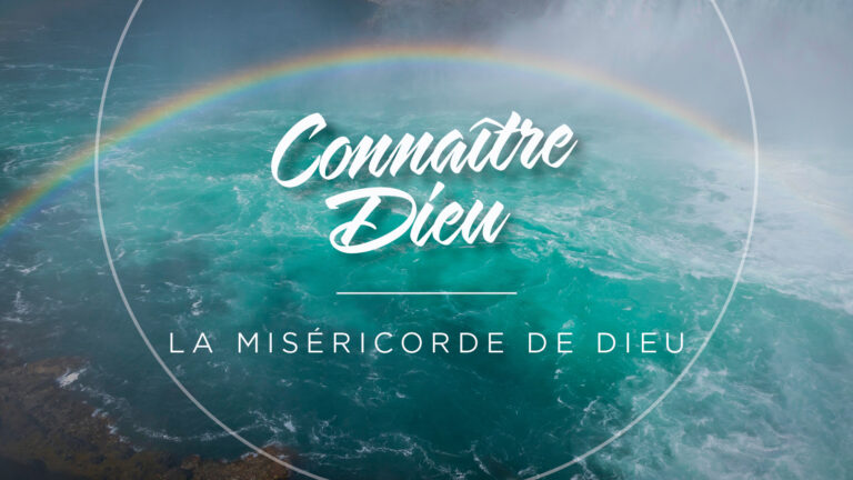 Mercy of God: A picture of a rainbow over the ocean in the background.