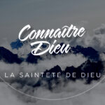 Holiness of God: The top of many mountains with clouds surround it.