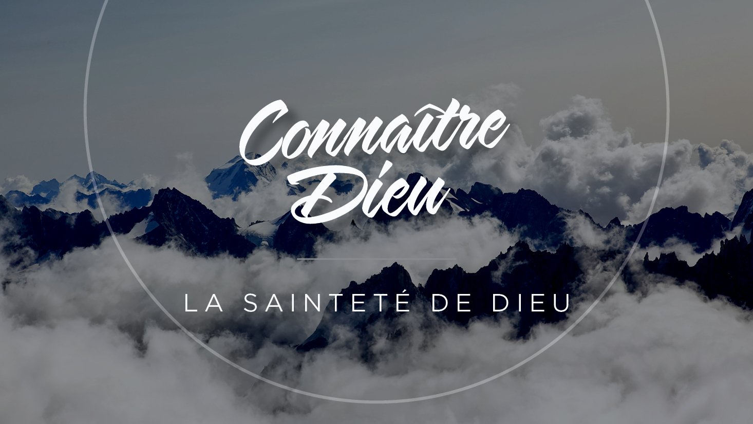 Holiness of God: The top of many mountains with clouds surround it.